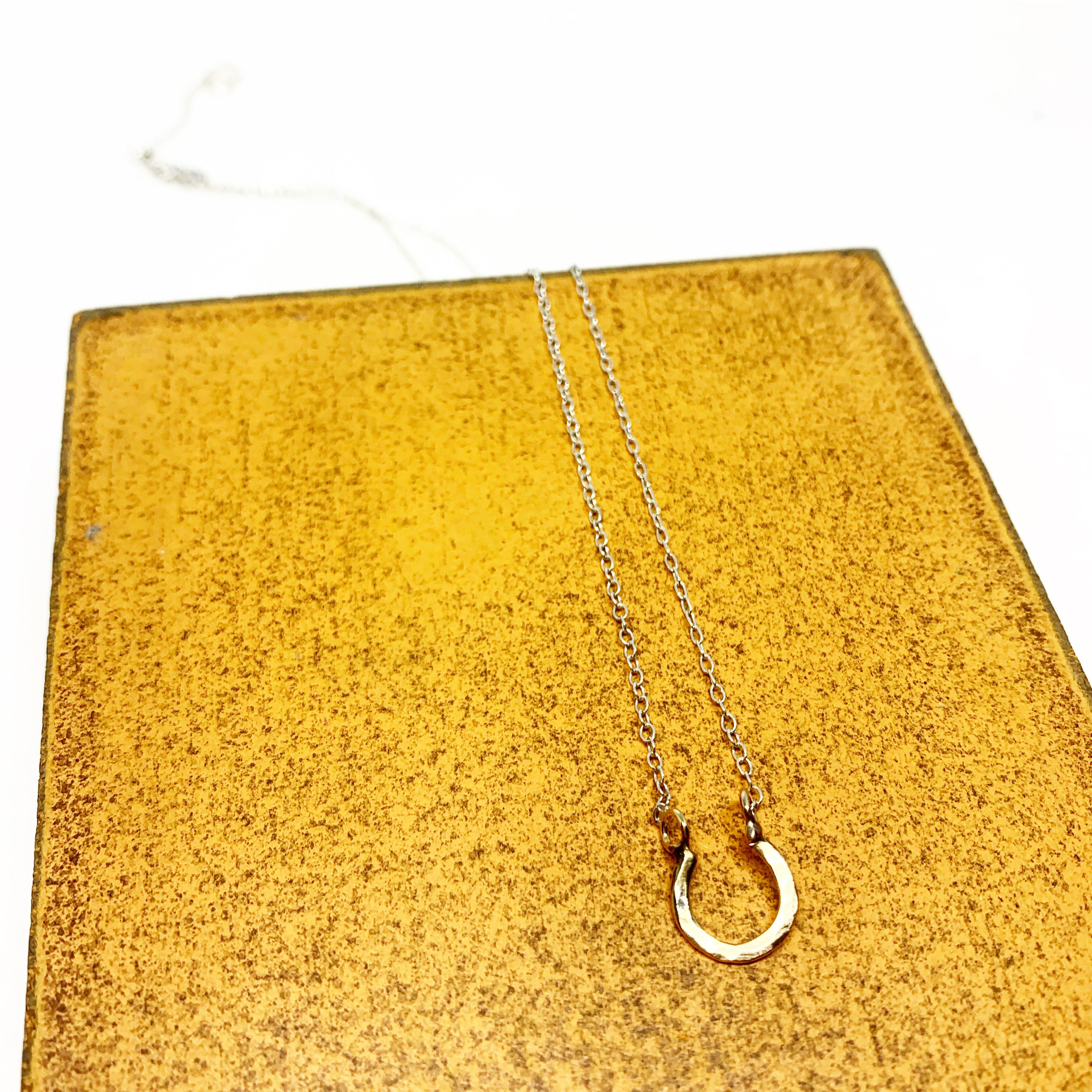 Mini Lucky Horseshoe Charm Necklace by Jennifer Cervelli Jewelry