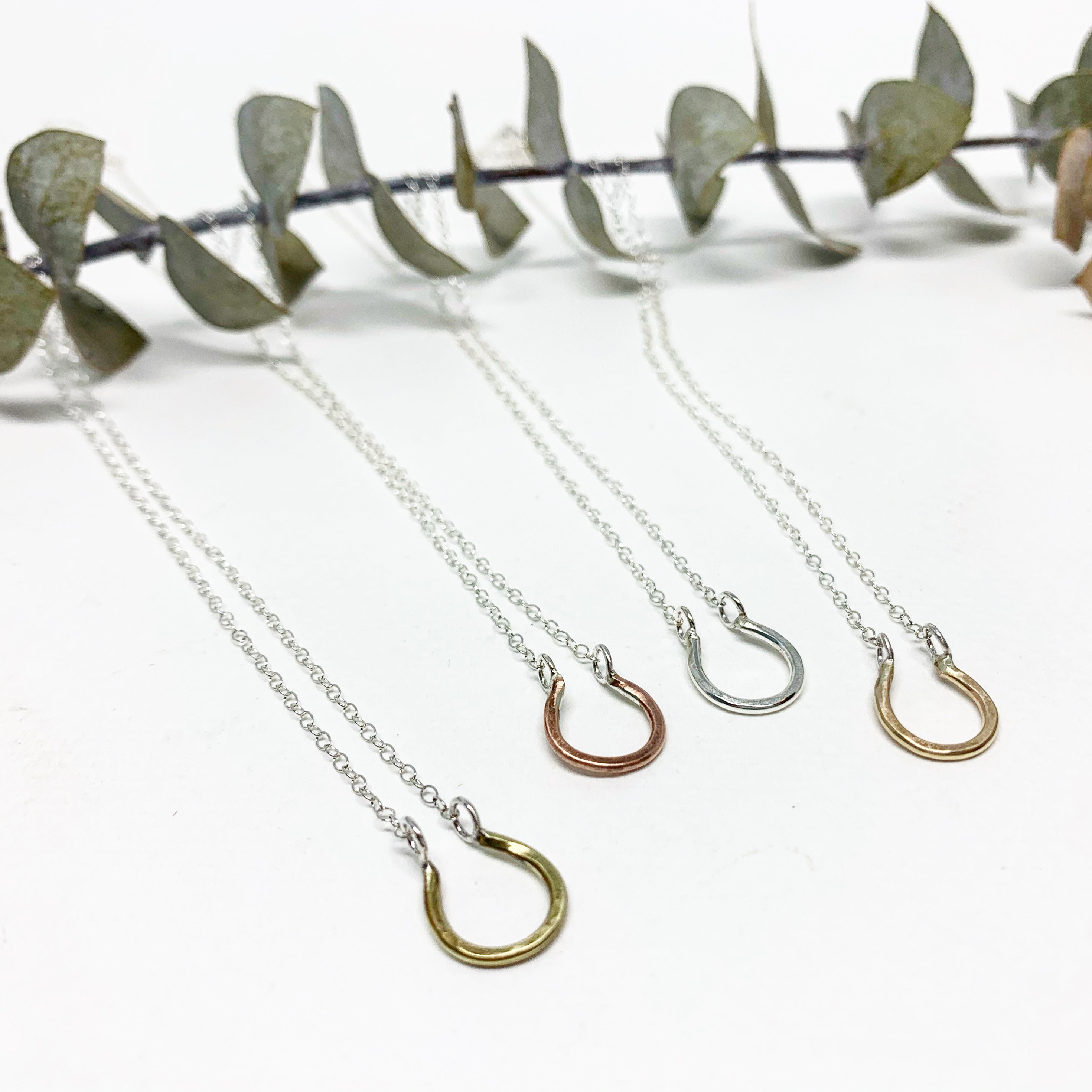 Mini Lucky Horseshoe Charm Necklace by Jennifer Cervelli Jewelry