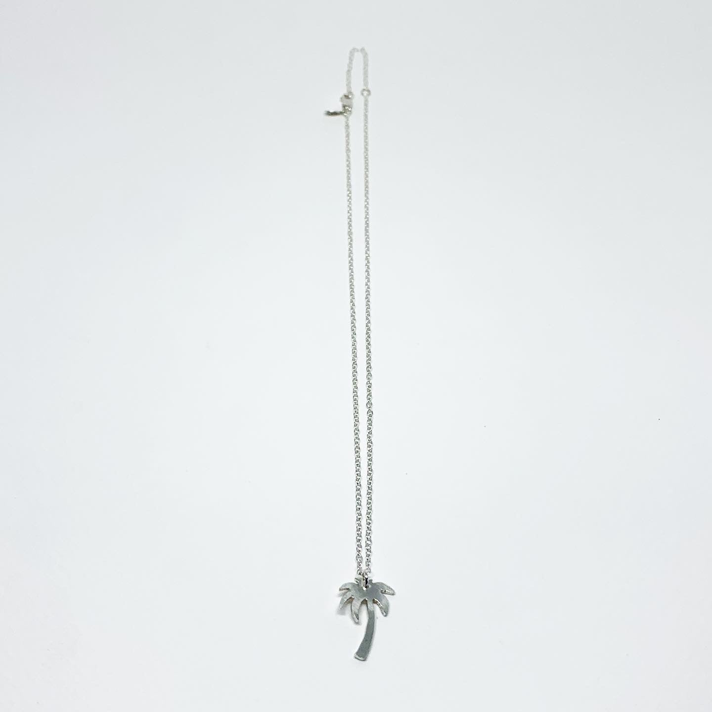 Palm Tree Charm Necklace by Jennifer Cervelli Jewelry
