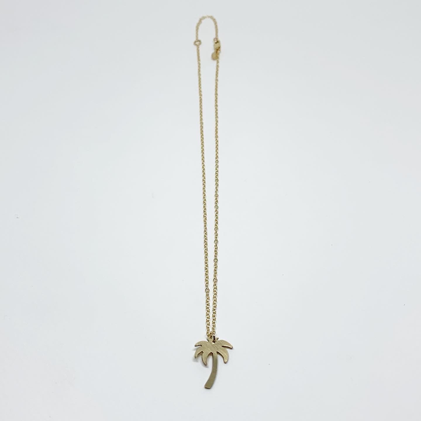Palm Tree Charm Necklace by Jennifer Cervelli Jewelry