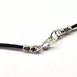 Sterling Silver Autism Awareness Puzzle Piece Leather Necklace by Alexa Martha Designs