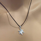 Sterling Silver Autism Awareness Puzzle Piece Leather Necklace by Alexa Martha Designs