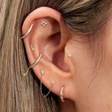 14K Gold & Diamond Twisted Huggie Hoops by eklexic