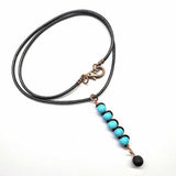 Copper Turquoise Pendant With Lava Rock Charm