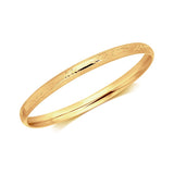 14k Yellow Gold Dome Style Childrens Bangle with Diamond Cuts (5.50 mm)