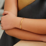 14k Yellow Gold Childrens Bangle with Spiral Motif Style (3.50 mm)