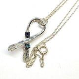Silver Suicide Prevention Awareness Ribbon Necklace with Purple and Teal Crystals by Alexa Martha Designs