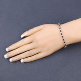 6.87 ct.. t.w. Blue Sapphire and White Topaz Bracelet in Sterling Silver