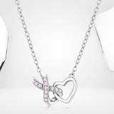Avera Interlocking Heart Ribbon Pendant Necklace in Silver — One Size / Silver — view 1