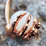 Rose Gold Plated Skeleton Hand Holding Crystal Ball Navel Ring by Fashion Hut Jewelry
