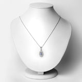 0.56 Carat Genuine Tanzanite and White Topaz .925 Sterling Silver Pendant