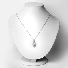 0.56 Carat Genuine Tanzanite and White Topaz .925 Sterling Silver Pendant